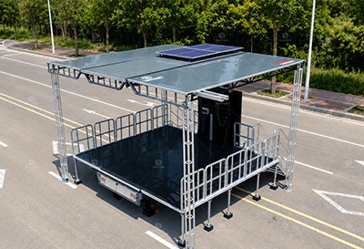 Solar-powered mobile stage trailer